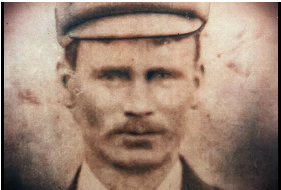 Portrait photograph of John Collins
